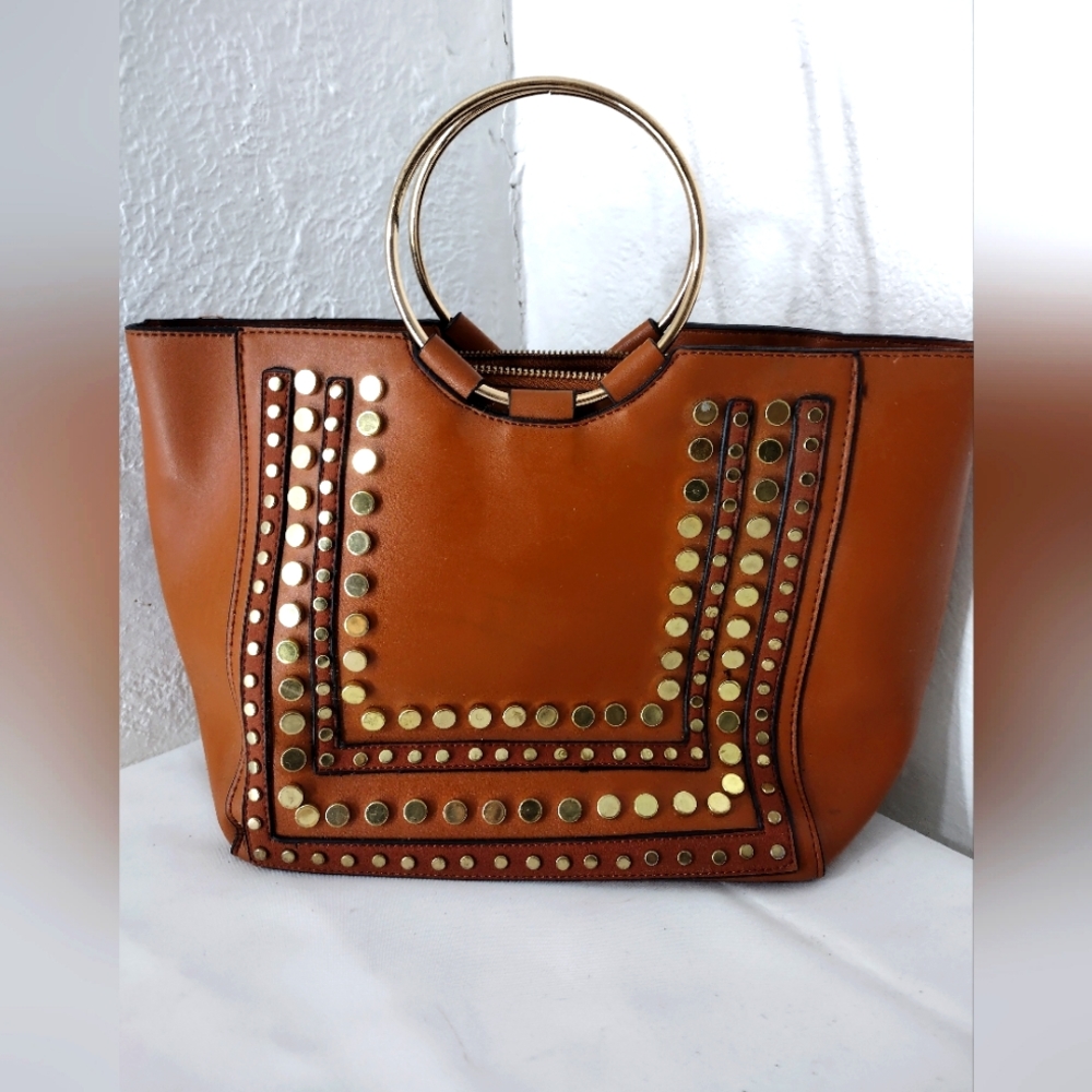 Women's faux leather gold studded handbag